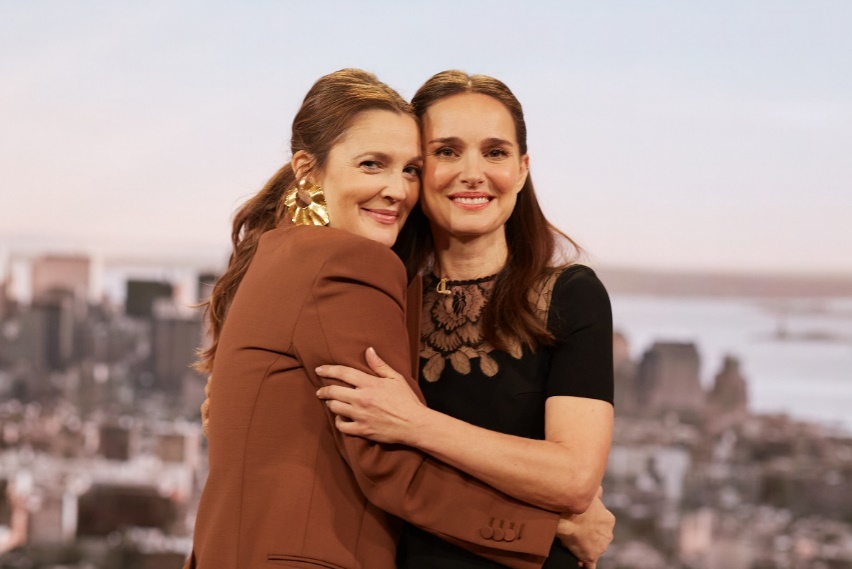 Two women hugging each otherDescription automatically generated