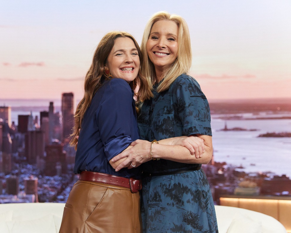 Two women hugging each otherDescription automatically generated