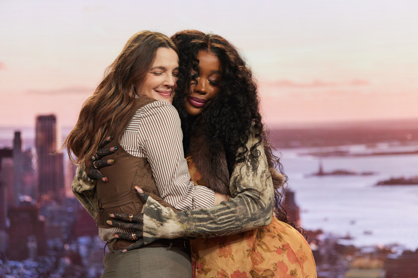 Two women hugging each otherDescription automatically generated