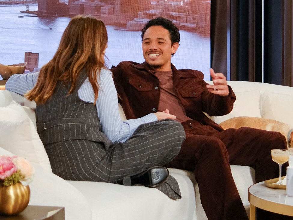 A person and person sitting on a couchAI-generated content may be incorrect.