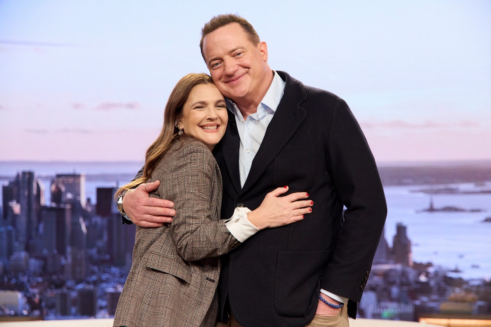 A person and person hugging each otherAI-generated content may be incorrect.