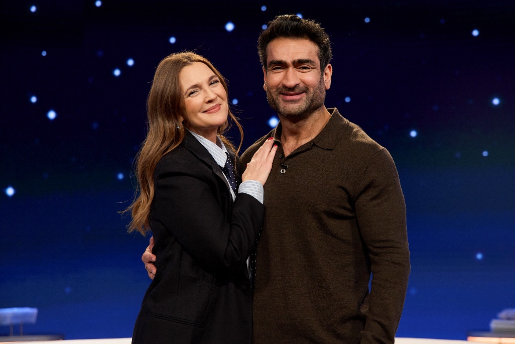 A person and person posing for a pictureAI-generated content may be incorrect.