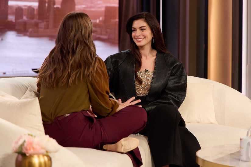 A person sitting on a couch talking to another personAI-generated content may be incorrect.